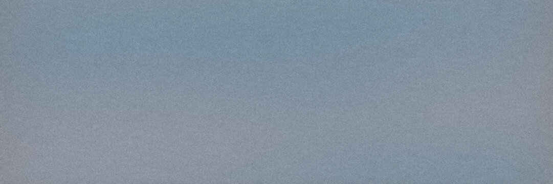 Muted slate blue gradient with fine grain in a wide horizontal format, offering a sophisticated, calming backdrop for business presentations, websites, or minimalist designs.