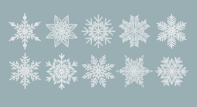 Intricate Snowflake Patterns Set Against a Soft Blue Background.