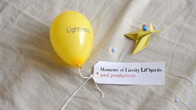Yellow balloon with lightness and levity message