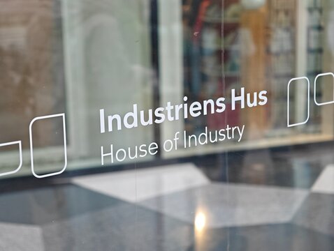 Copenhagen,Denmark-Nov.24th 2025: sign on the glass door of Industriens Hus in Copenhagen