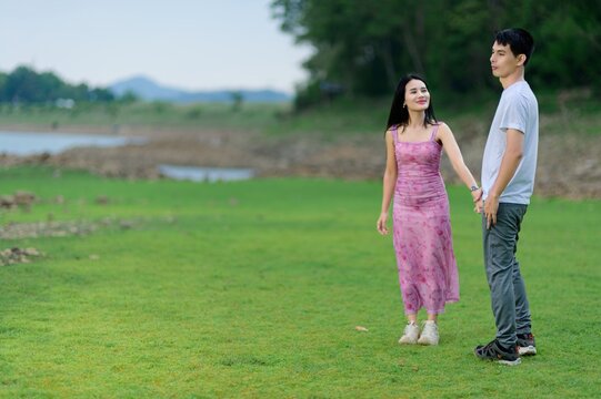 Couple Enjoying Nature at Sai Thong Reservoir in Nakhon Nayok, Thailand