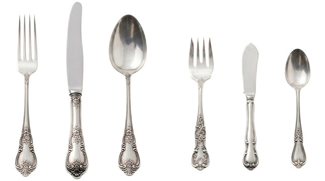 Elegant vintage silver flatware set: forks, knives, spoons in a row, ornate handles on transparent background.