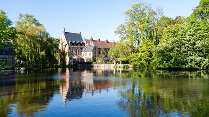 Fototapeta premium Buildings by Minnewater Lake in Bruges