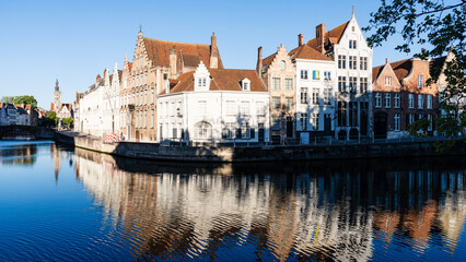 Naklejka premium Red Brick Medieval Buildings by Bruges Canal