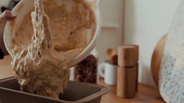 Pouring Homemade Cake Batter into Loaf Pan 4K