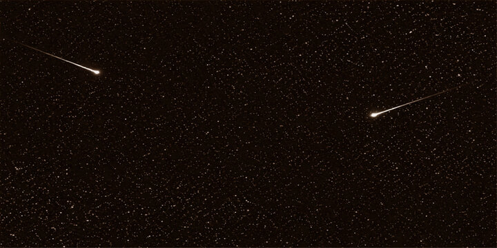 Close up macro needle with cosmic star dust abstract space texture dark galaxy background