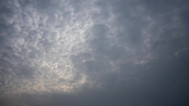Gray and white textured clouds covering the sky in an overcast day