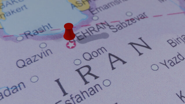 Red pin on Tehran, Iran on a world map, travel destination marker, Middle East tour, navigation, points of interest