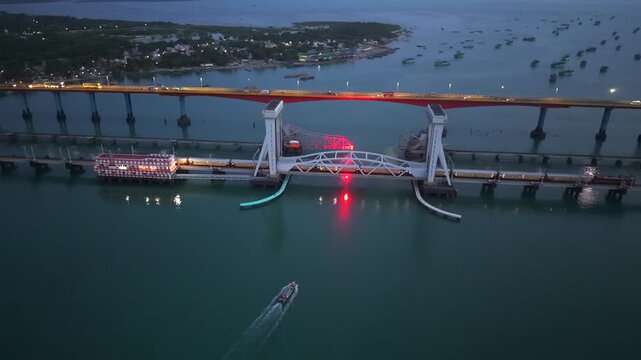 Aerial Night View of Train Crossing Pamban Bridge in Rameswaram Tamil Nadu India