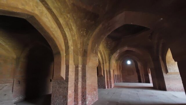 Weathered Interior Walls and Ancient Islamic Relief Patterns Inside the Historic Kabuli Bagh Mosque in Panipat