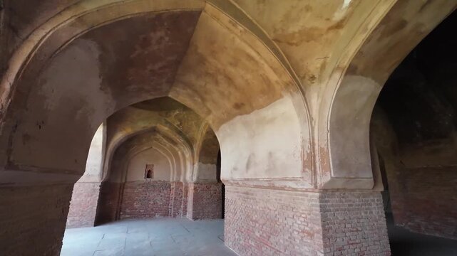 Weathered Interior Walls and Ancient Islamic Relief Patterns Inside the Historic Kabuli Bagh Mosque in Panipat
