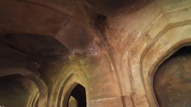 Weathered Interior Walls and Ancient Islamic Relief Patterns Inside the Historic Kabuli Bagh Mosque in Panipat