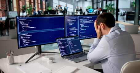 Fototapeta na wymiar Frustrated Programmer Struggles Alone Late Night Coding Web