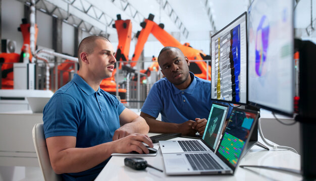 Young Automotive Engineer Uses 3D Simulation Software Analyzing Electric