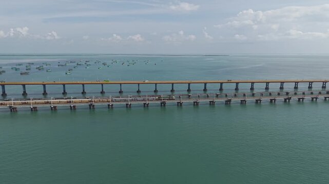 Aerial View of Train Crossing Pamban Railway Bridge in Rameswaram Tamil Nadu India