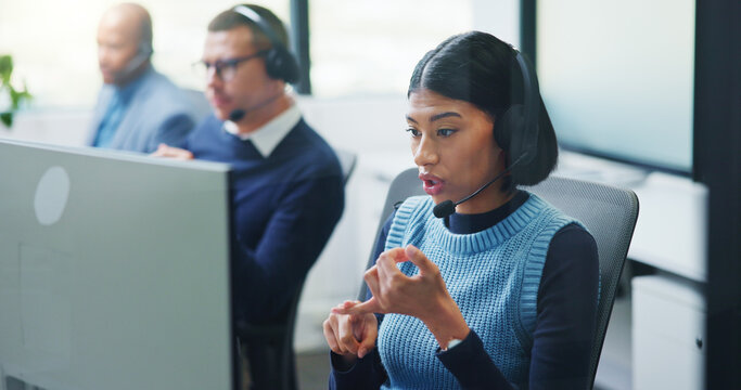 Discussion, woman and headset at computer in call center for cold calling, explain offer and agent. Telemarketing, sales consultant or talk on tech for product knowledge, lead generation or coworking