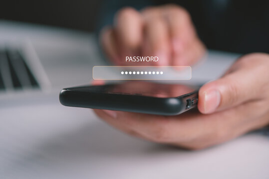 Hands holding smartphone with virtual password login screen overlay