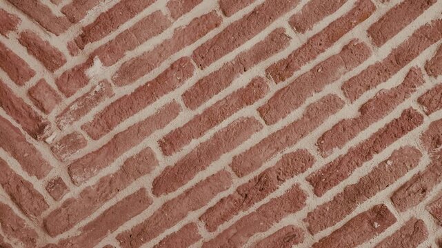 Diagonal brick wall texture background with rustic masonry pattern loop video