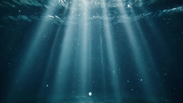 Sunlight beams through ocean water.