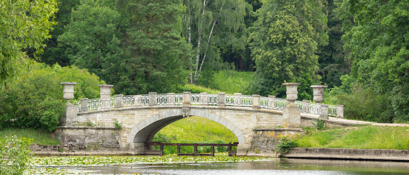 Ultra Wide Panorama of Viskontiyev Bridge and Slavyanka River in Pavlovsk Park, Saint Petersburg, Russia