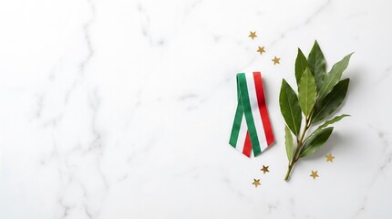 Top down view of tricolor ribbon laurel branch and gold stars on white marble background