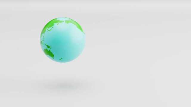 Earth Planet Spinning and Floating on Gray Background with Copy Space, Seamless Loop 3D Animation