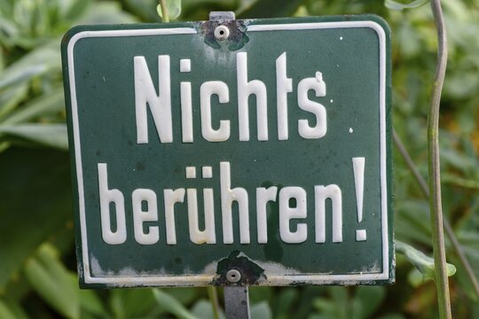 Prohibition sign, Touch nothing, Writing on sign, Germany