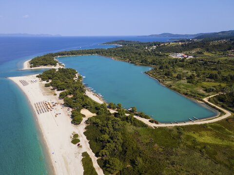 Aerial view, lagoon, beach and harbour, Glarokavos, Pallini, Kassandra Peninsula, Chalkidiki, Greece