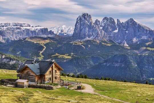 Rasch&ouml;tzh&uuml;tte on the Rasch&ouml;tzalm in front of the Sella Group 3152m, Marmolata 3343m and Sassolungo Group 3181m, Ortisei, Val Gardena, Val Gardena, Dolomites, Province of Bolzano, South Tyrol, Trentino-Alto Adige, Northern Italy, Italy