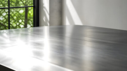 Fototapeta premium Empty stainless steel table top counter with blurred modern room background