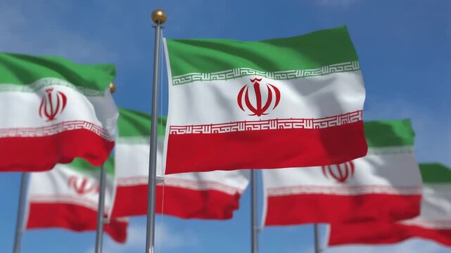 Flags of Iran Waving Proudly in Clear Blue Sky with National Emblem and Kufic Script Borders Representing Identity, Sovereignty, and Cultural Heritage