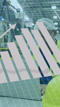 Vertical video: Plant tech typing laptop, starting data overlays and analyzing charts for ops