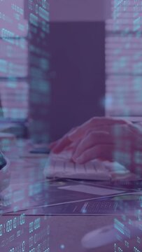 Vertical video: Hands starting typing and moving mouse on desk for analysis, animating tech overlay