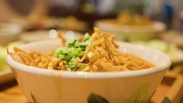 Northern Thai Khao Soi Curry Noodle Soup in Ceramic Bowl