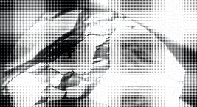 Close-up of a crumpled paper against a flat surface with shadows