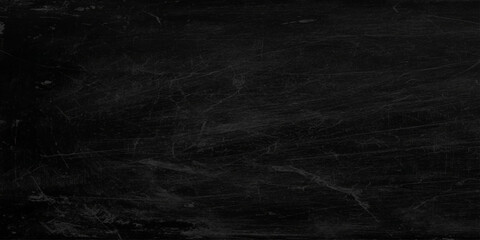 Dark scratched blackboard background with white marks and scratches for writing or drawing, Empty space for creative expression © Daiyan