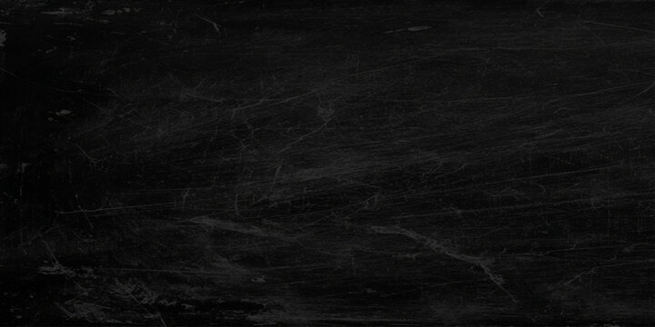 Dark scratched blackboard background with white marks and scratches for writing or drawing, Empty space for creative expression