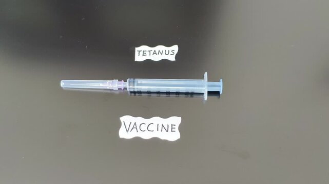 Prevention and protection vaccination for tetanus bacterial infection by Clostridium tetani bacteria from body dirty cuts or wound injuries. DTaP, Tdap and Td vaccine injection concept.