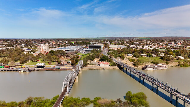 Murray Bridge City, South Australia: 4K Aerial Drone view of Murray River, Road Bridge, Railway Bridge, Low Density Houses with Solar Panels, Estates, Shops, Parks, Scenic River Landscape