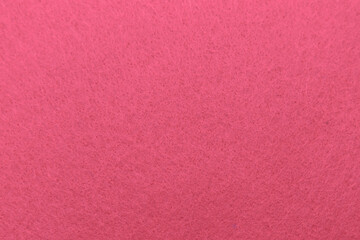 Fototapeta premium Bright pink texture background space for text on a flat surface ready for design or writing