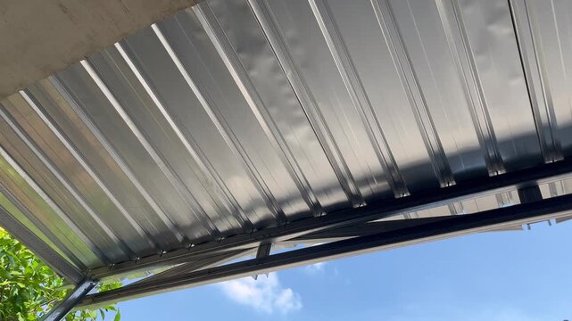 Modern corrugated galvalume roof structure with lightweight steel frame
