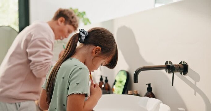 Bathroom, oral health and children with toothbrush, wash teeth and cavity prevention with toothpaste. Clean, mouth and kids with dental care equipment for fresh breath, wellness and hygiene in home