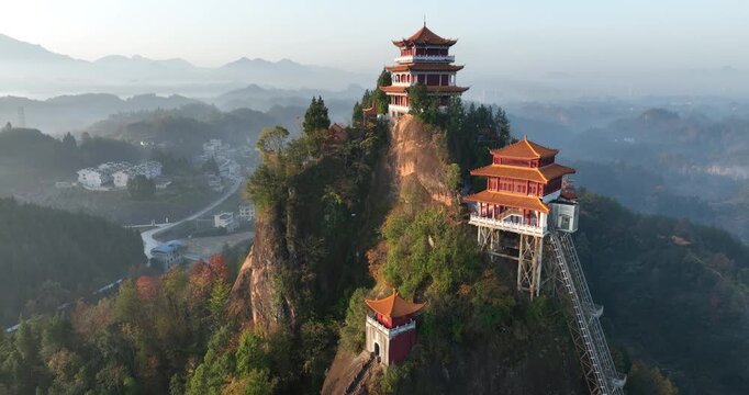 Sunrise and ancient chinese buddha temple landscape in Hunan province,China