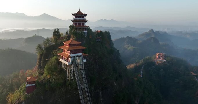 Sunrise and ancient chinese buddha temple landscape in Hunan province,China