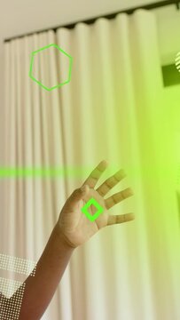 Vertical video: Right hand rising, dot appearing, palm opening while green AR HUD aligning tracker