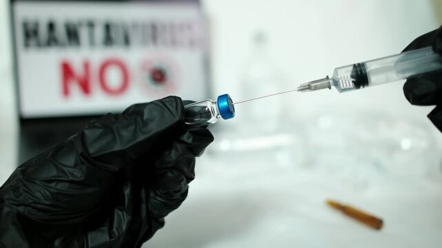 Close-up medical footage showing syringe and vaccine vial with blurred laboratory background. Healthcare, medicine development and immunization concept.