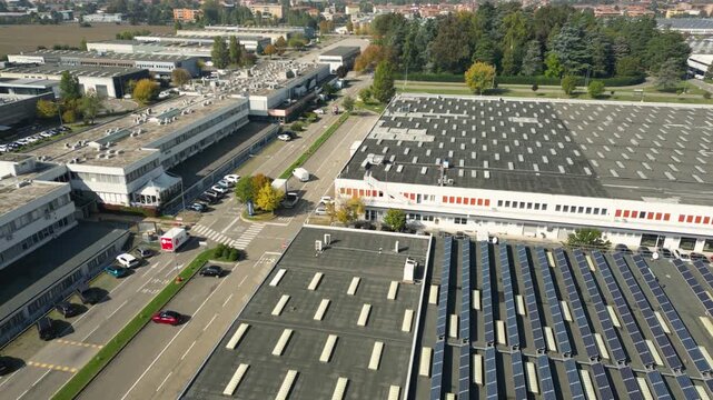 Aerial drone footage of a warehouse and parking area inside a wholesale and logistics center near Bologna, Emilia-Romagna, Italy.