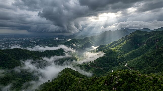 Aerial Monsoon Clouds Over Margalla Hills with Dramatic Green Mountain Landscape