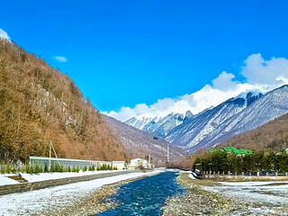 Mzymta river embankment in Rosa Khutor. Roza Khutor is an alpine ski resort located near Krasnaya Polyana town in Sochi region, Russia. © natavilman