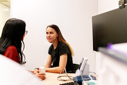 Two women having conversation about the prescribed medicine